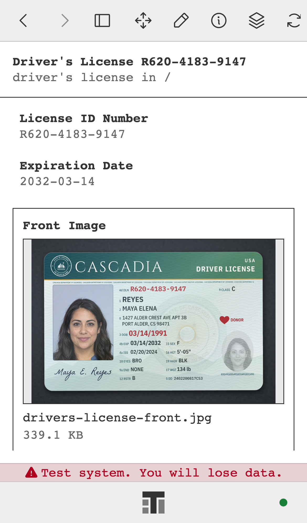 A driver's license record on a phone, with its license number, expiration date, and front image.